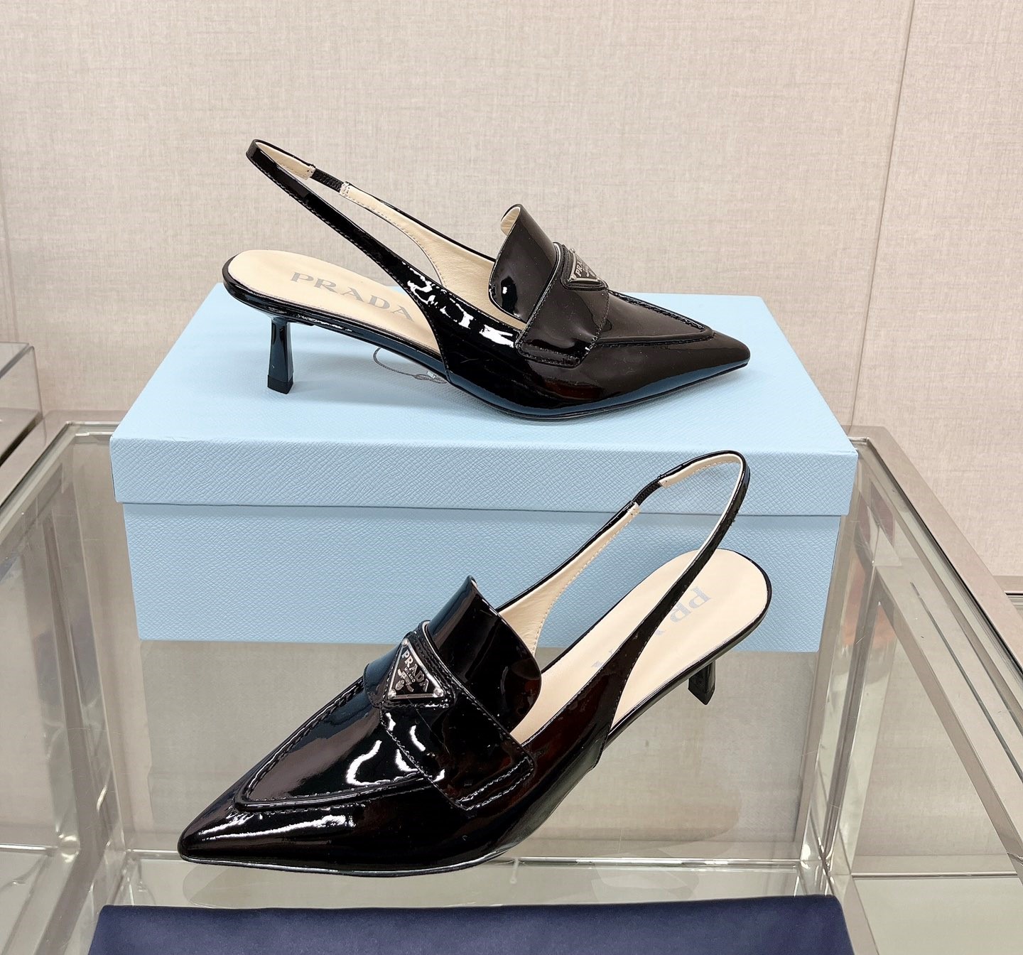 Bagsaaa Pra*a Patent black leather slingbacks (45 mm)